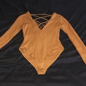 Golden brown strappy long sleeve bodysuit